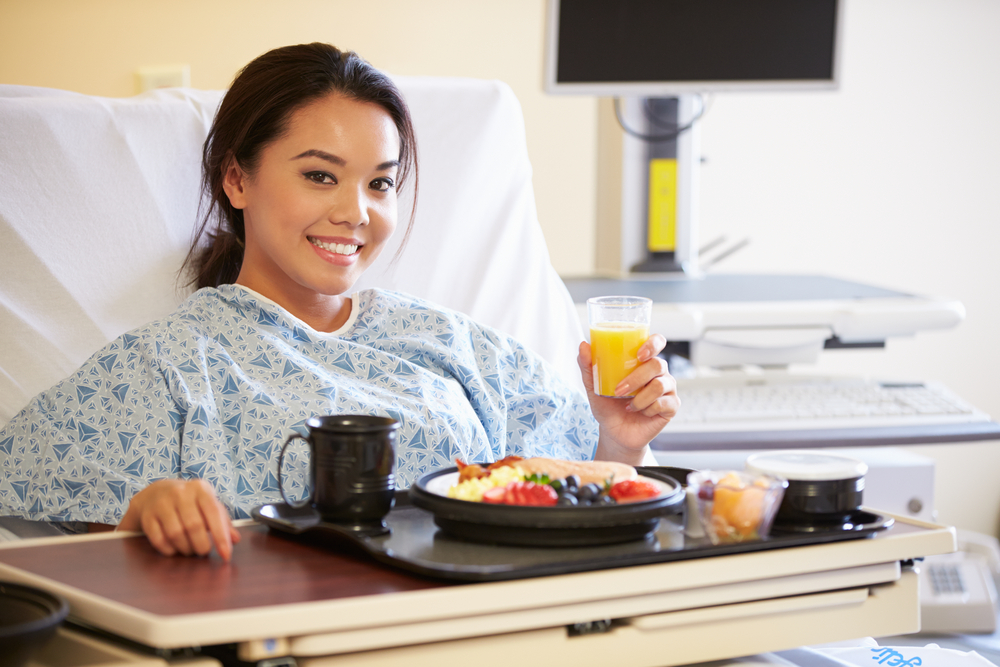 patient having meals at the hospital bed
